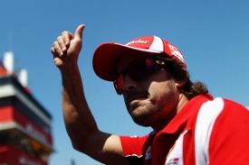 BARCELONA, SPAIN - MAY 22:  Fernando Alonso of Spain and Ferrari attends the drivers parade before the Spanish Formula One Grand Prix at the Circuit de Catalunya on May 22, 2011 in Barcelona, Spain.  (Photo by Vladimir Rys/Getty Images)