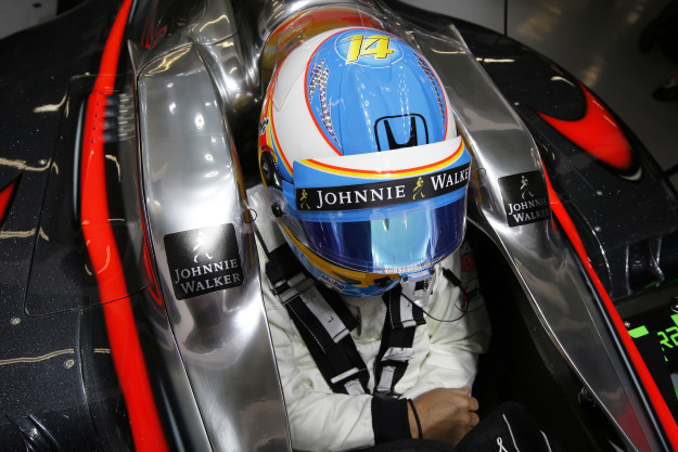 Fernando Alonso in the garage.